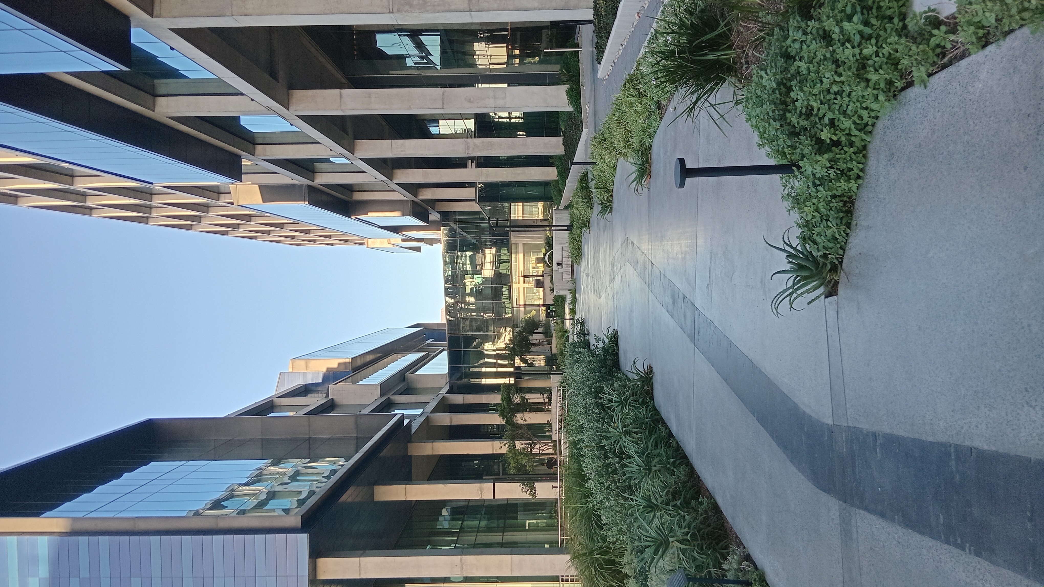 Modern glass office complex — venue for the AWS Serverless Immersion Day